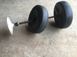 broken lawn cart wheel and axle.