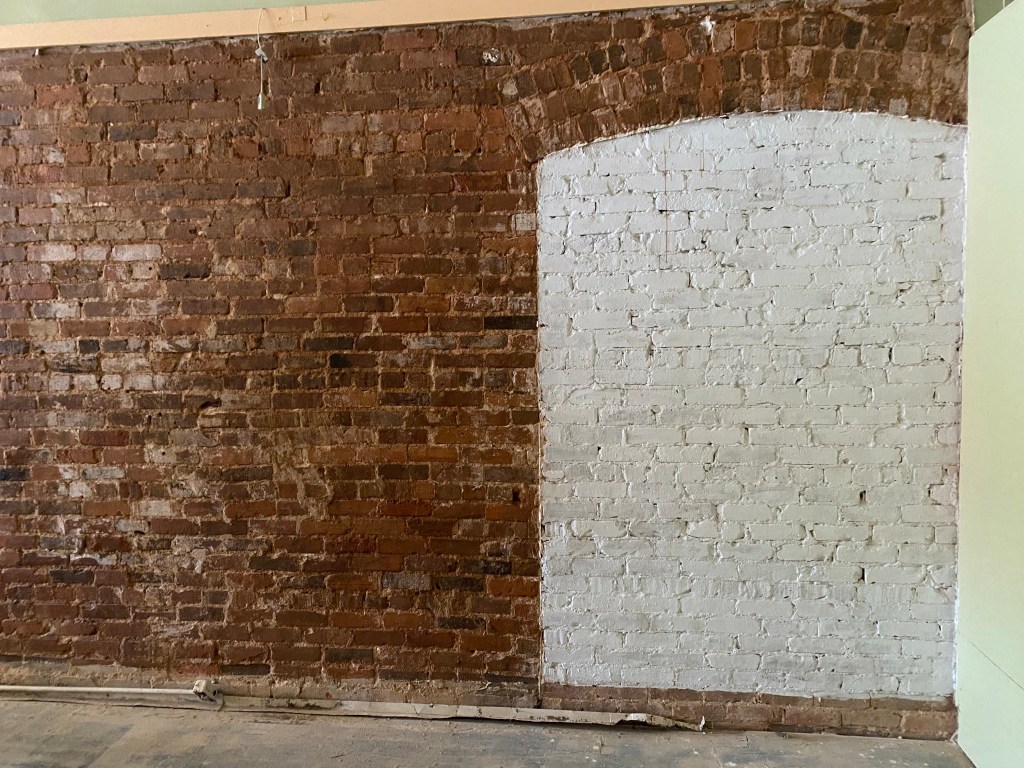 Brown and white archway wall